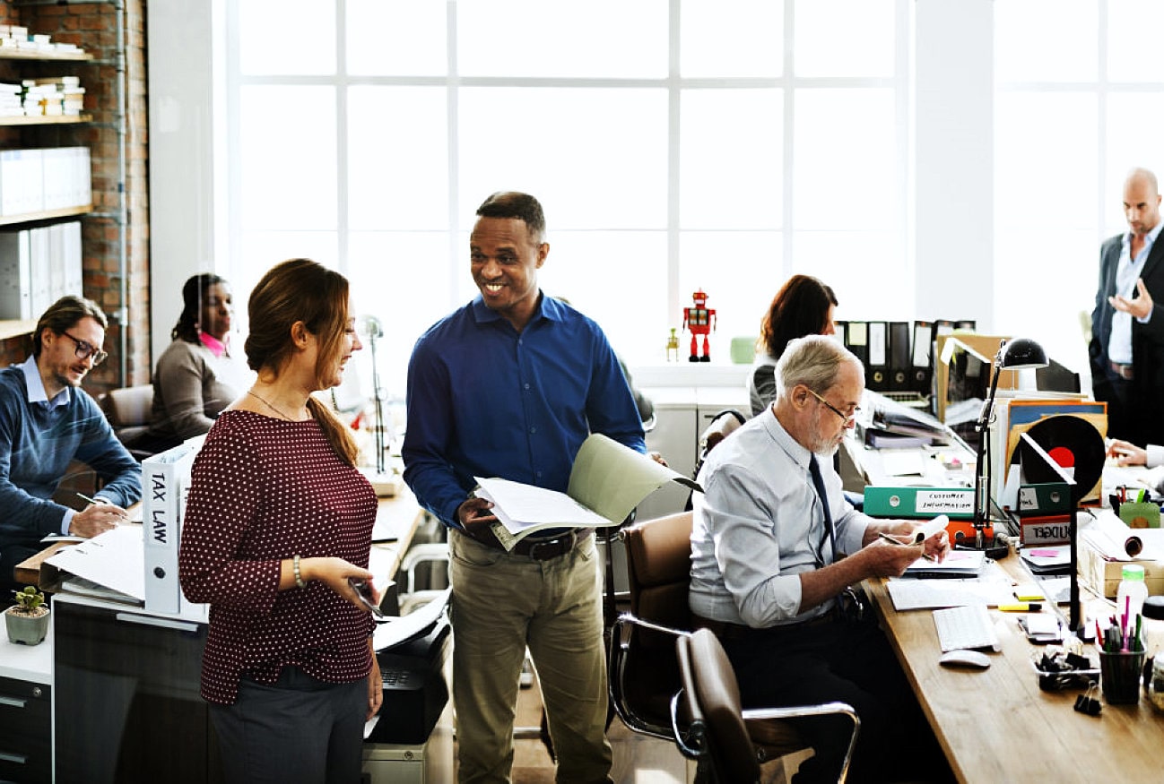 group of people working in an office